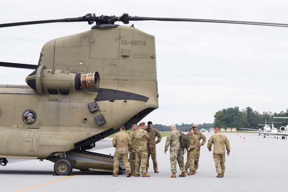 Air National Guard crews unload food and water flown into Asheville, North Carolina, for Hurricane Helene survivors, September 30, 2024